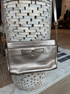 Kate Spade New York Beacon Court Angelica metallic bronze leather bow